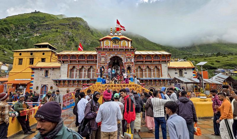 Badrinath Temple, Pramod Nautiyal, BKTC, Badrinath Donation Row, Uttarakhand Police, Chamoli Police, Surjit Singh Panwar, Ganesh Godiyal, Mahendra Bhatt, Shri Badrinath Kedarnath Temple Committee, Temple Donation Irregularities, Dehradun News, Uttarakhand News, Bhairav Sena, Donation Embezzlement